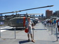 Kev in front of one of the helicopters he was in in Vietnam