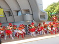 Children performing on stage in the park