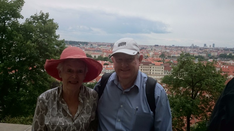 The honeymooners on a hill overlooking Prague