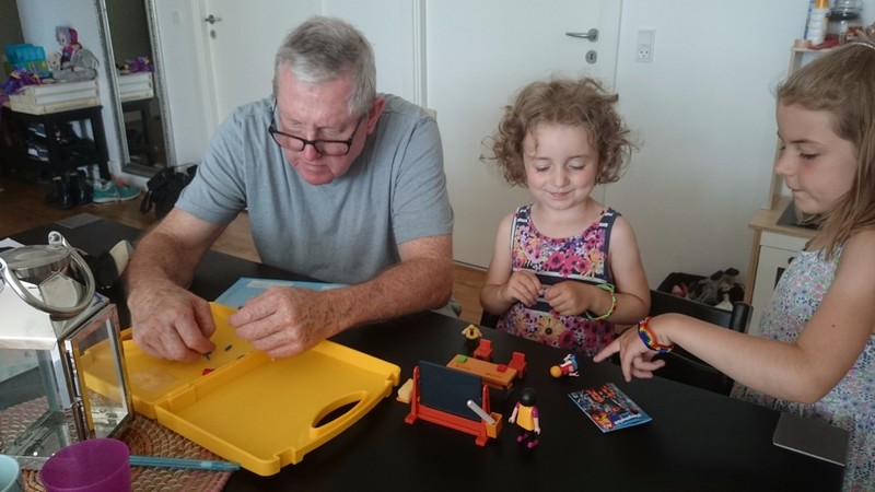 Grandpa helps Evie put her pressie together