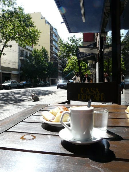 My daily cafe con leche at a sunny terrace