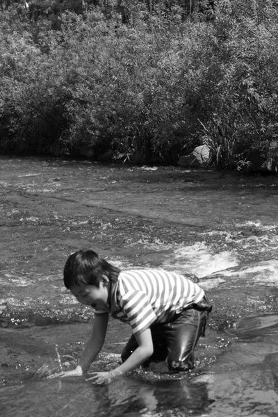 Boy in the stream