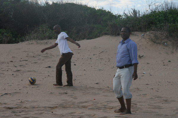Thabo and Nkeka playing soccer
