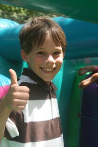 Jonas gives the bouncy castle a thumbs up