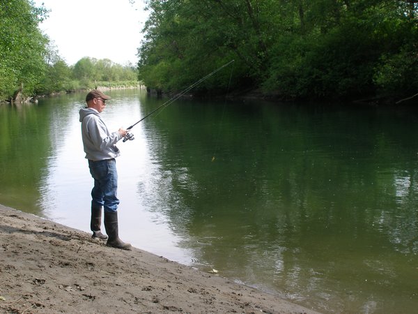 Dad fishing on the river