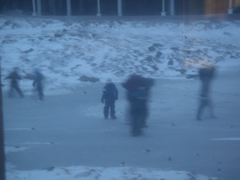 kids playing on some ice