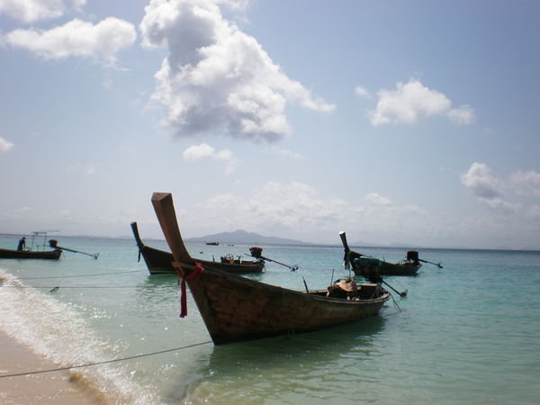 Long-Tail Boats off of Bamboo