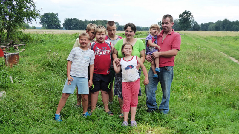 Our partner family in their farm field.