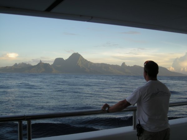 passing by moorea at sunrise