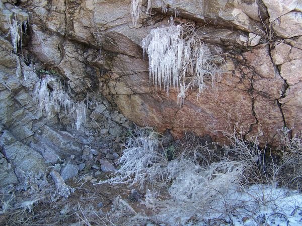 Cliff face with icicles