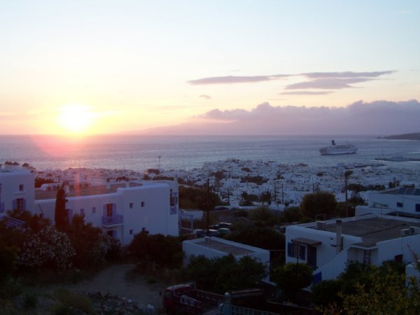 Sunset over Mykonos town from the balcony of our pension