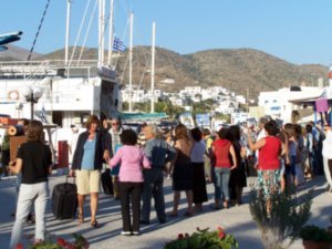 The pension owners meeting the ferry in the town of Katapola, Amorgos