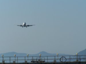 An approaching plane getting ready to land