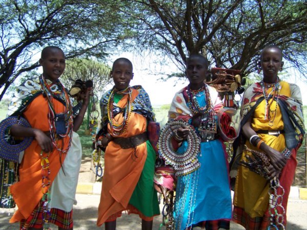 Masai women with all the things they want to sell to you