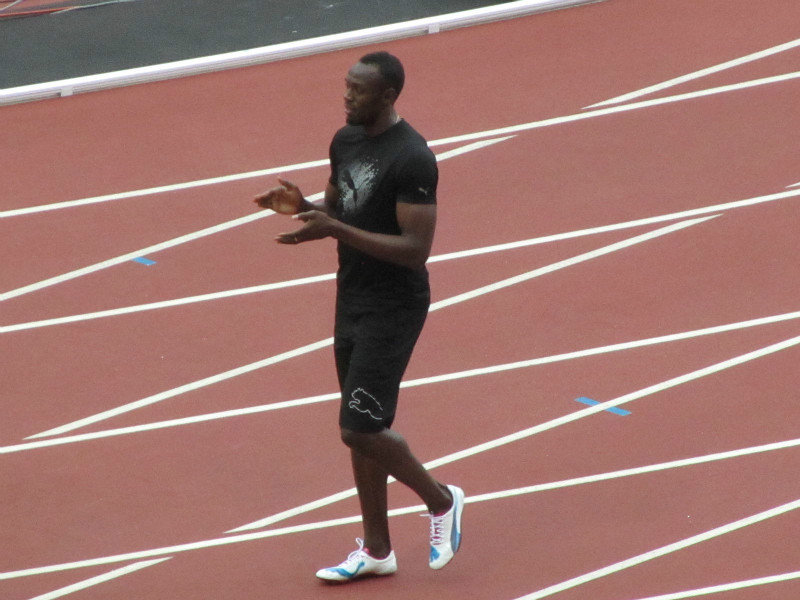 Usain Bolt enters the stadium