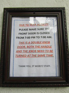 Sign by the door of our hotel in Aspen!