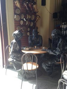 The "living statues" taking a coffee break.