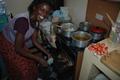 Celest Cooking Tilapia from Lake Victoria