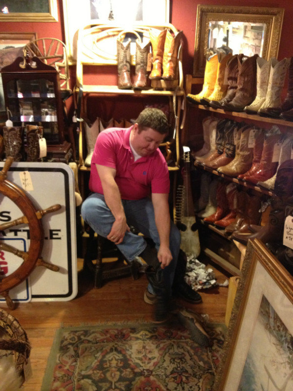 Colby Trying On Antique Boots