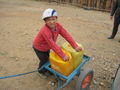 Kid hauling water in the slums