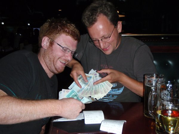 T and Ben sorting out the cash