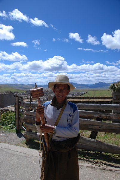 Tibetan Man with His Prayer Wheel