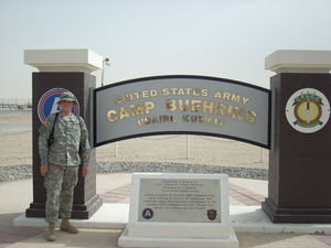 Me in front of the base sign