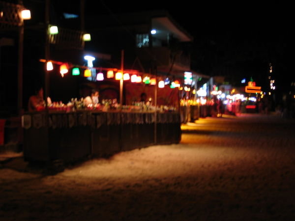 Stalls on the beach selling buckets of alcohol!