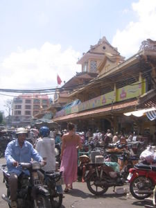 Outside of the market in the midst of full-blown motorbike chaos