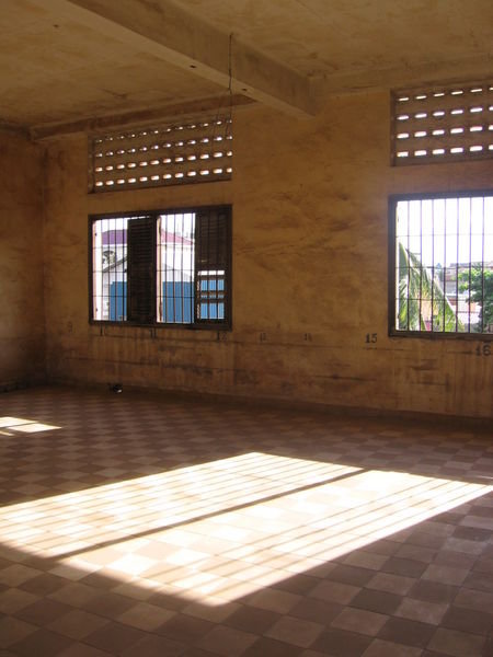 Such contrasts - beautiful sunlight bathes a large group holding cell