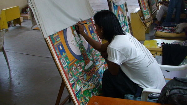 A thangka painter.