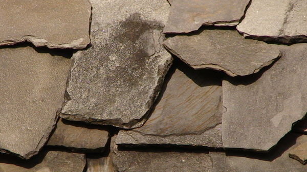Thick slates on roof.