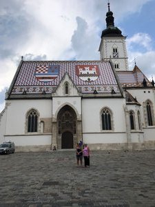 Jesuit Church with city and County flags