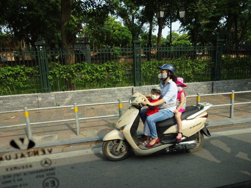 Babies everywhere on mopeds