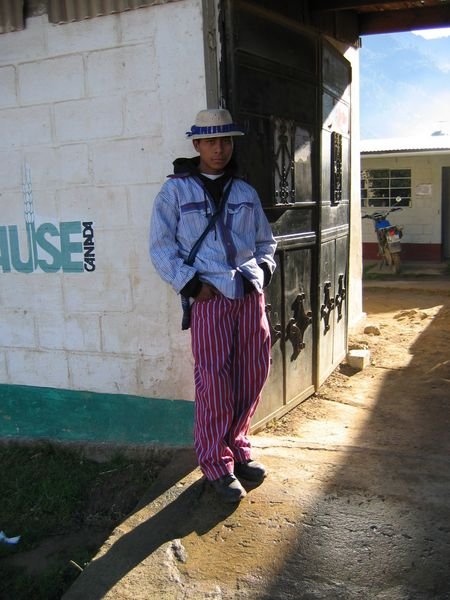 Teenager wearing traditional dressing, Todos Santos Cuchumatan