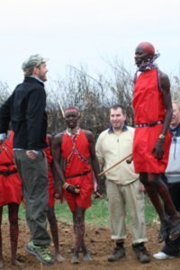 Snorre jumping with a Masai Warrior