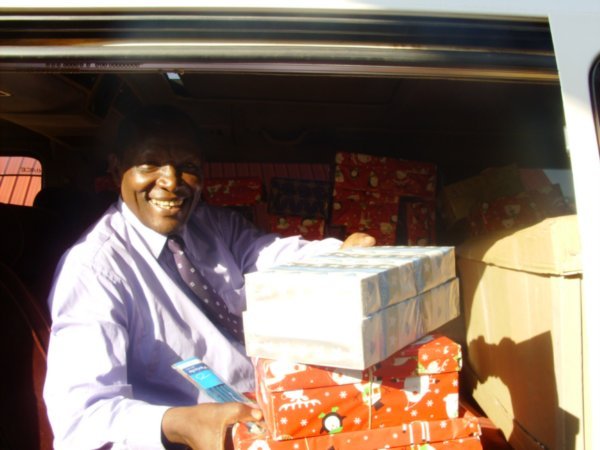 Uncle Paul unloading van of presents for the children