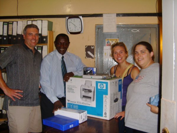 Mike, Kelly, Uncle Paul, and Me with new printer machine