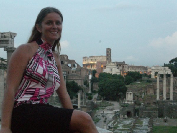 Nicole in front of the Roman Forum at night