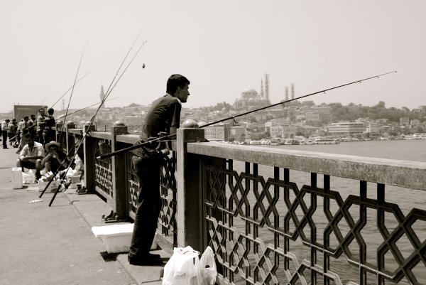 fisherman on bridge