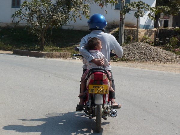 Motorbikes are the main mode of transportation for the locals