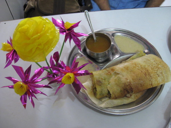 dosa and plastic flowers