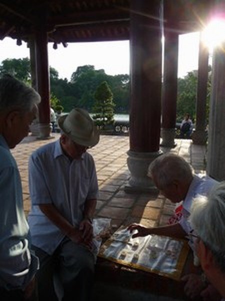 Men playing Chinese Chess