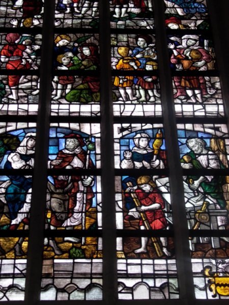 The stain glass windows inside the Oude Kerk