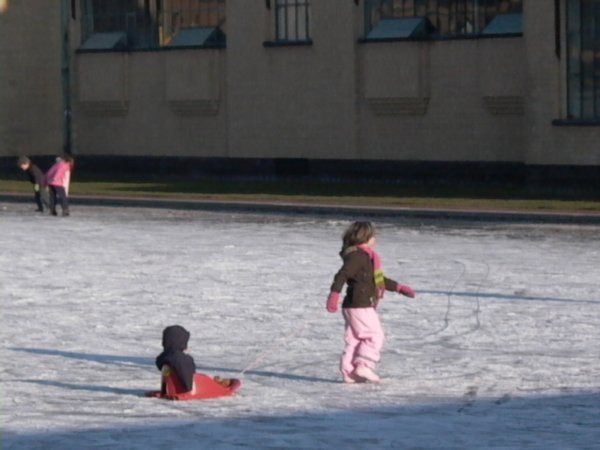 more kids playing in the ice