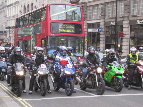 Transport workers protest public transport by stiking the tube and riding around on Motorcycles