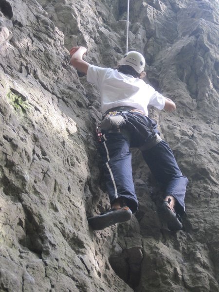 Jacco climbing the route