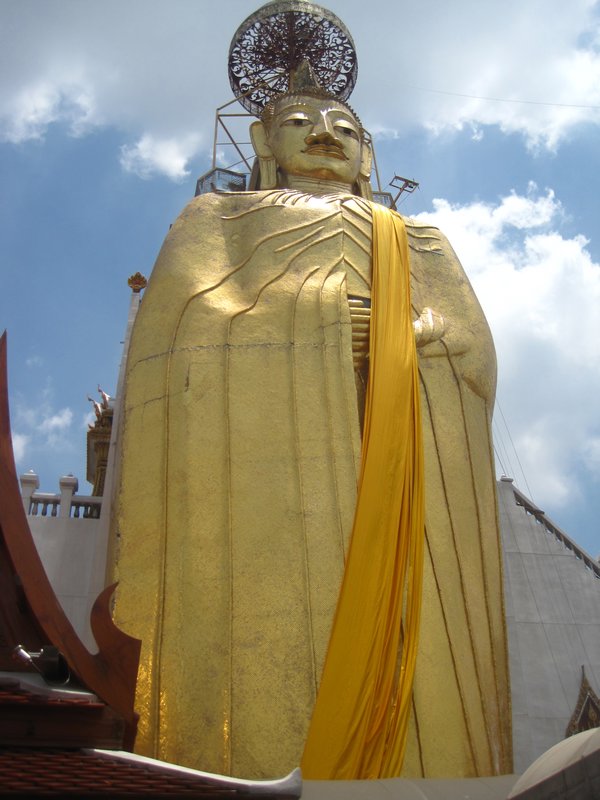 Looking up at the standing Buddah