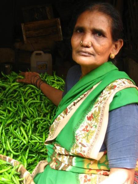 is it us, or do their saris tend to match their produce... 