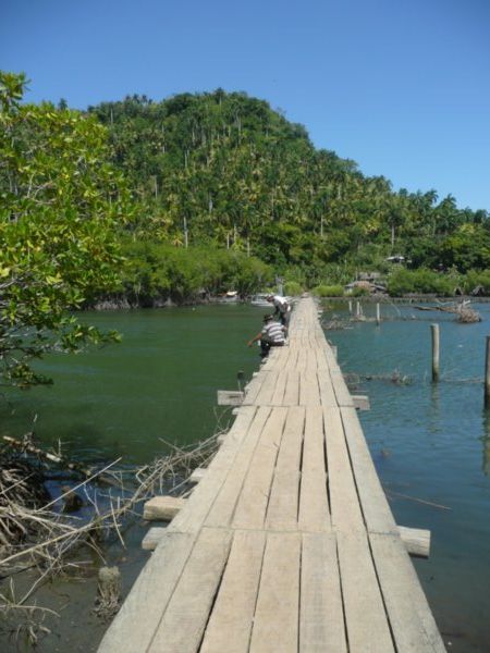 crossed the bridge over the Rio Miel to a private beach 